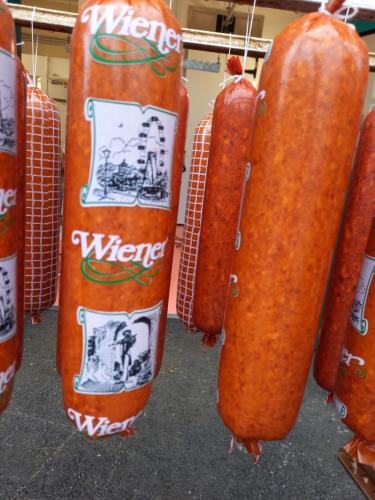 a group of orange water bags are hanging up at Apartment Schönwetter in Großsölk