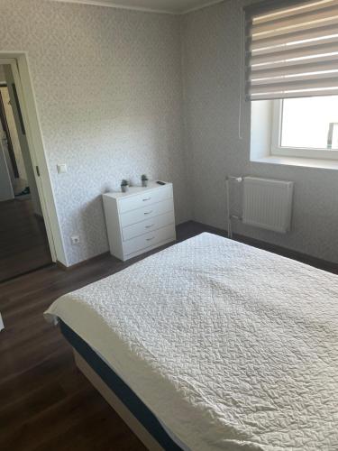 Cama ou camas em um quarto em Soelaane 12 Apartment2