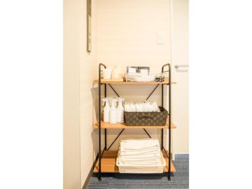 מיטה או מיטות קומותיים בחדר ב-Fujieda Ogawa Hotel - Vacation STAY 20879v