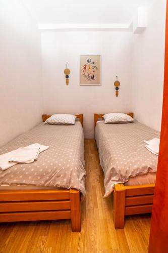 Postel nebo postele na pokoji v ubytování Apartman Gordana