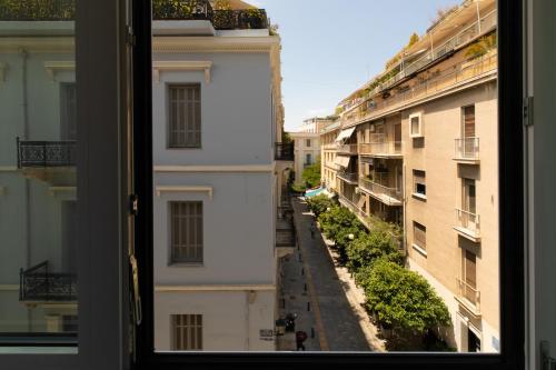 a view of a street from a window at Minimal apartment in Plaka in Athens