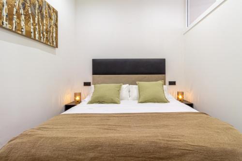 Postel nebo postele na pokoji v ubytování Ünique Apartment Centro de Vigo
