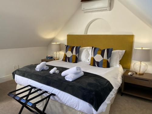 Katil atau katil-katil dalam bilik di Les Chambres Guest House