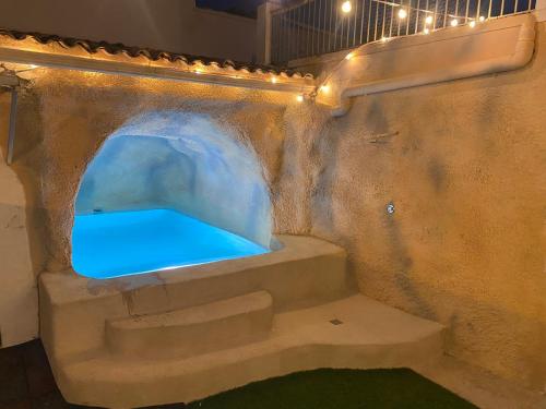 a set of stairs in a play house with blue water at Casa Mayor in Tous