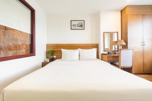 Postel nebo postele na pokoji v ubytování One Hotel