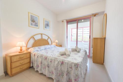 Posteľ alebo postele v izbe v ubytovaní Apartamentos Nuevo México C 451