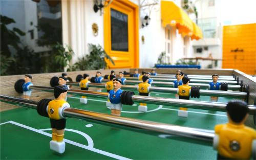 a group of lego men playing a game on a table at Stay Banaras - A Boutique Hotel in Varanasi