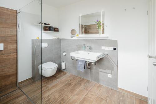 Ένα μπάνιο στο Ferienhaus Seewind2