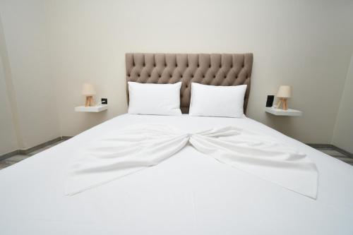 Postel nebo postele na pokoji v ubytování Central cozy apartment
