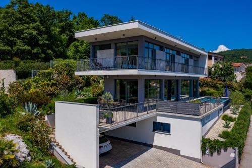 an aerial view of a house with a balcony at Villa The View Opatija in Opatija