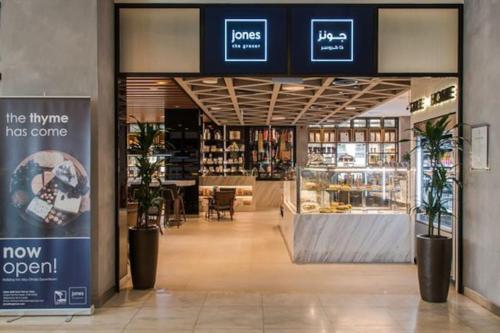 a store front of a store with plants in it at BEST 2 Bedroom Apartment Beach Front (Sea View) in Abu Dhabi