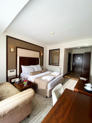 Katil atau katil-katil dalam bilik di Lavin Hotel & Spa