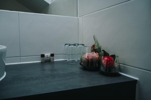 a counter top with some dishes on top of it at Appartement Steinbichler in Graz