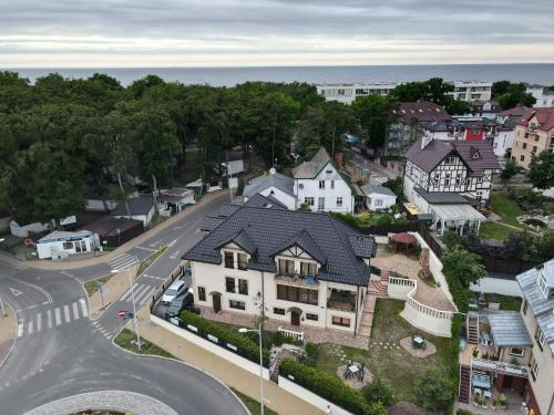 an aerial view of a large house in a city at Willa 56 in Międzyzdroje