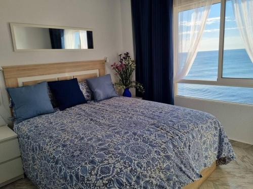 Posteľ alebo postele v izbe v ubytovaní Amaizing flat with sea view