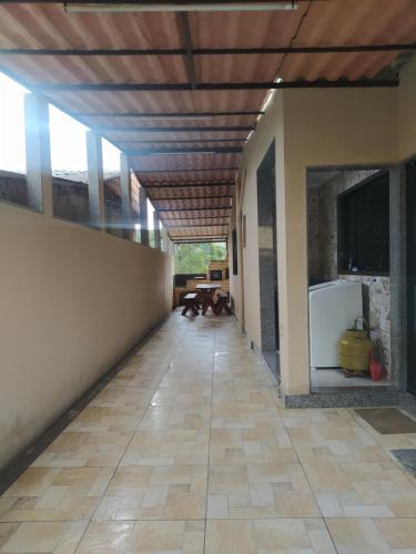 an empty hallway of a house with a ceiling at Casa da Montanha in Miguel Pereira