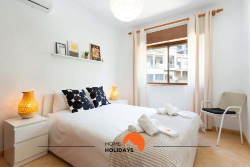 Postel nebo postele na pokoji v ubytování #114 T2 Foxy H by Home Holidays