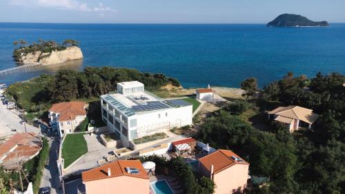 an aerial view of a house with the ocean at Villa Danae in Laganas