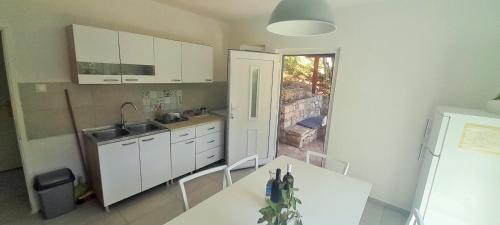 Kuchyň nebo kuchyňský kout v ubytování Apartman Bonkovic
