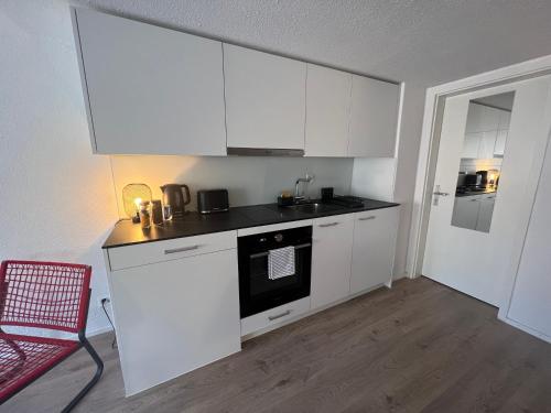 Dapur atau dapur kecil di Appartement en vieille ville de Porrentruy