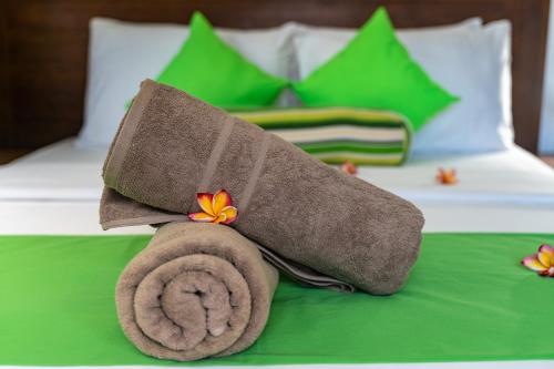 Katil atau katil-katil dalam bilik di Kanasuk Self catering Apartments