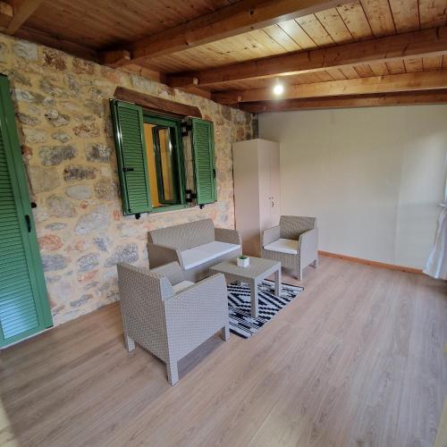 Coin salon dans l'établissement Harcons Home