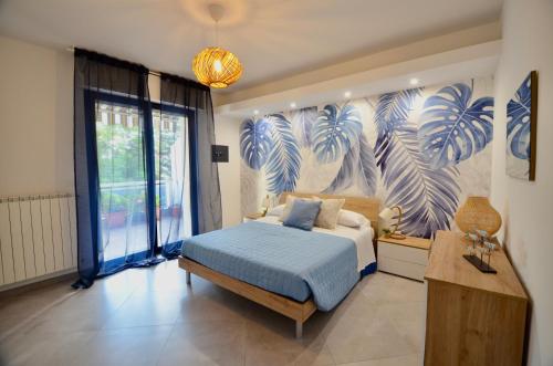 Postel nebo postele na pokoji v ubytování TraMonti Apartments Pescara