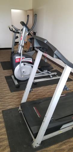 a bike sitting on the floor next to a room at Baymont by Wyndham Harlan in Harlan
