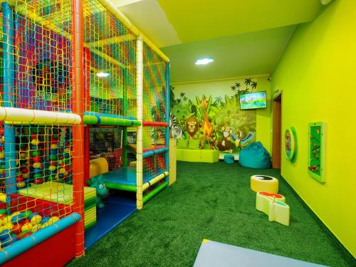 a childs play room with colorful walls at Hotel Liptakówka in Białka Tatrzanska
