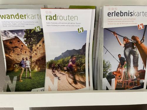a stack of magazines on a shelf at Jugendstil-Hof in Langenlonsheim