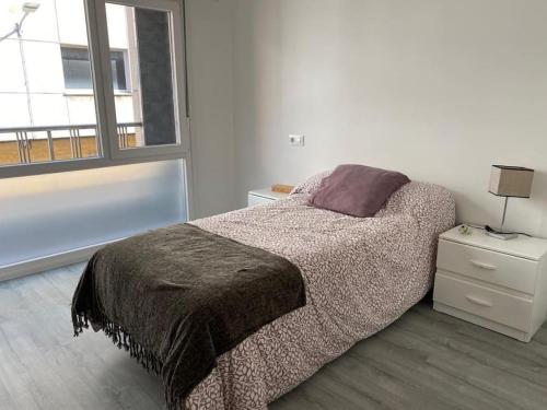 Postel nebo postele na pokoji v ubytování Vibes Coruña - Carballo 18