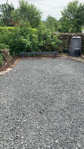 a tv sitting on top of a gravel driveway at Newton Bothy in Stirling