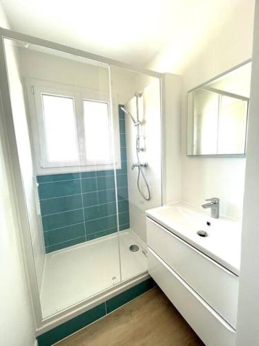 Bilik mandi di Vue océan, superbe appartement
