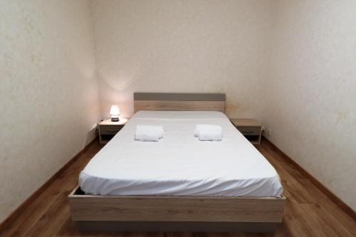 Ένα ή περισσότερα κρεβάτια σε δωμάτιο στο Lancelot - Jardin - Parking - Port à pied - Wifi