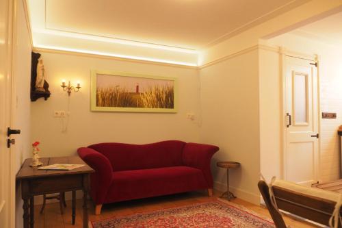 Posezení v ubytování B&B Bureau Warmoesstraat