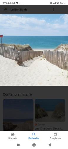 une page d'un site web avec une photo d'une plage dans l'établissement Mobile home, à La Turballe