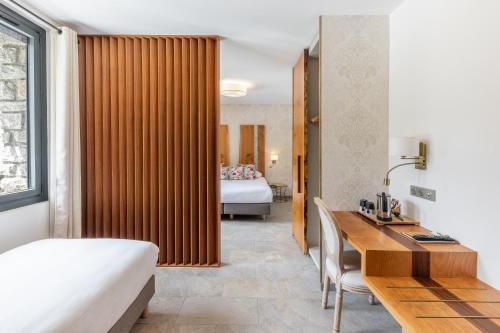 Katil atau katil-katil dalam bilik di Hôtel de la Restonica