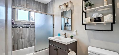 a bathroom with a sink and a shower at 15 mins to Venice Beach, LAX and Private Parking in Los Angeles