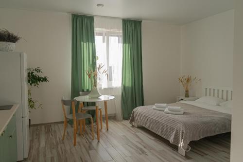 Postel nebo postele na pokoji v ubytování TREND HOUSE Apartments