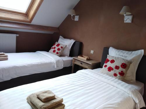 Postel nebo postele na pokoji v ubytování 't Hooghe Licht Bed & Breakfast