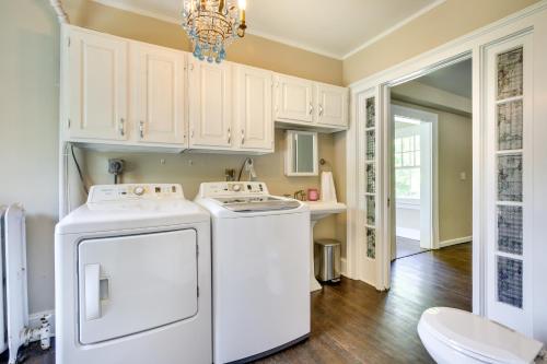 a kitchen with a white washer and dryer at Historic Poughkeepsie Home Near Arlington & Vassar in Poughkeepsie
