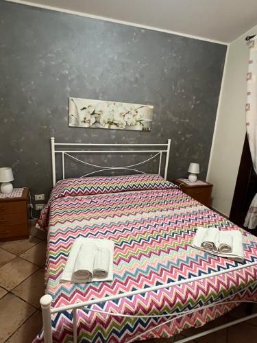 Una cama o camas en una habitación de Villetta di Venere