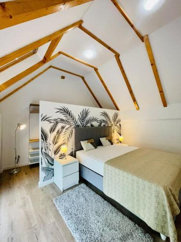Ένα ή περισσότερα κρεβάτια σε δωμάτιο στο Dendro Apartment