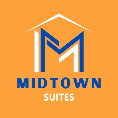 un nouveau logo pour les suites du centre-ville dans l'établissement Midtown Suites - Greenville, à Greenville