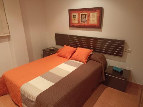 Säng eller sängar i ett rum på Garrisol