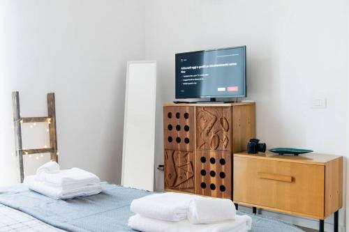 Un pat sau paturi într-o cameră la Petruzzelli Home