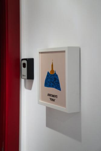 a white door with a sign on it at HAGAH Alojamentos in Guimarães
