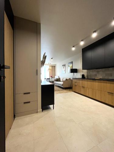Η κουζίνα ή μικρή κουζίνα στο WYSZYŃSKIEGO Apartment - Self Check-In 20h - Parking &Lift