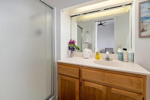 a bathroom with a sink and a mirror at Bright Spacious Studio High Ceilings Emerald Hills in Emerald Lake Hills
