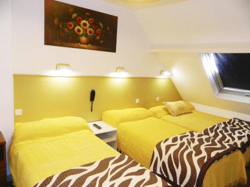 Katil atau katil-katil dalam bilik di Hotel Paris Star